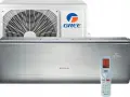 Klimatyzator Gree U-Crown w kolorze srebrnym, z pilotem i jednostką zewnętrzną.