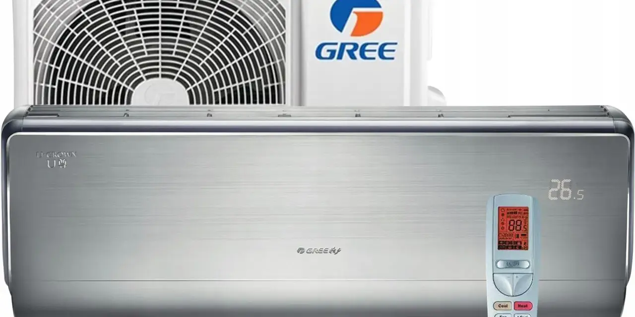 Klimatyzator Gree U-Crown w kolorze srebrnym, z pilotem i jednostką zewnętrzną.