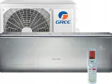 Klimatyzator Gree U-Crown w kolorze srebrnym, z pilotem i jednostką zewnętrzną.